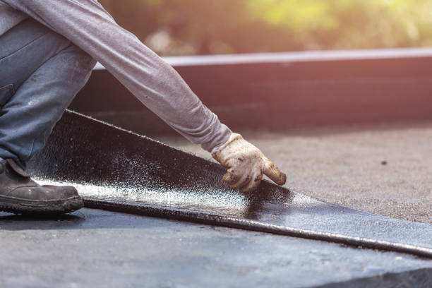 Professional Emergency Waterproofing technician working in Finksburg, MD